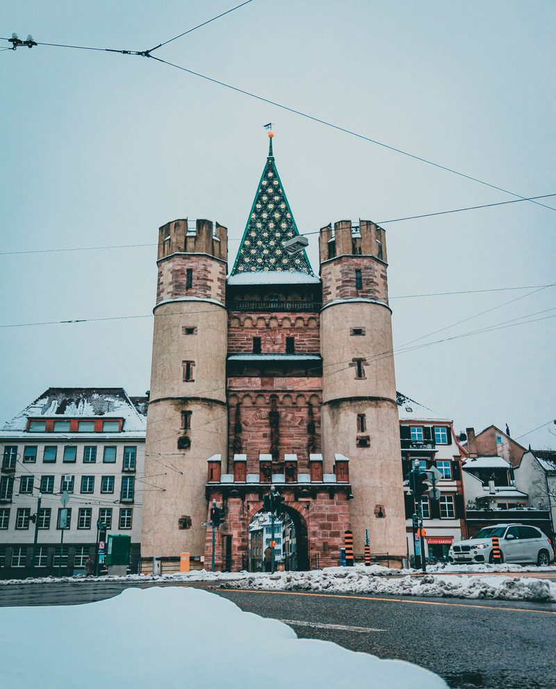 Spalentor, Basel’s medieval city gate, with its tiled roof and two round towers.
